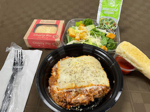 Beef Lasagna with Caesar Salad, Breadstick with Marinara and a Fruit Pie