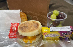 Bacon Egg & Cheddar Muffin with Hash browns, Cup of Grapes & Fig Bar