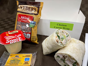 Chicken Caesar Wrap with Bag of Pretzels, String Cheese and Pudding