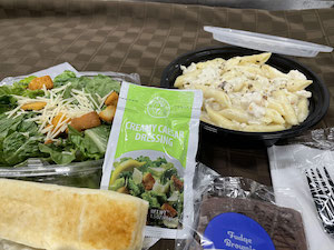 Chicken Alfredo Pasta, Garlic Breadstick, Caesar Salad with Oreos & Little Cutie Oranges